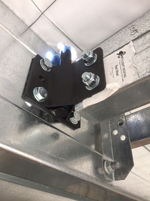 bracing plate attached to C-section purlin