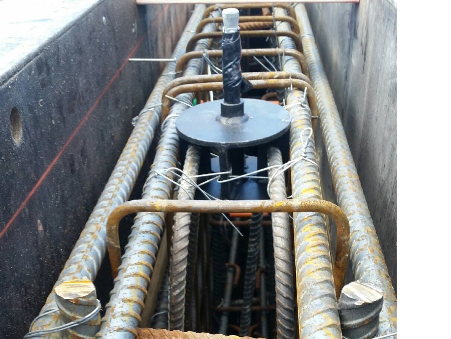 Reinforced Concrete Anchor with reinforcing bars running through