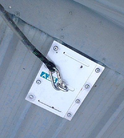 Installed surface anchor with a line attached